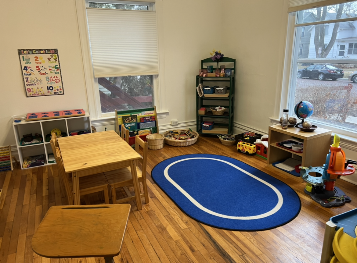sunny room with large blue rug